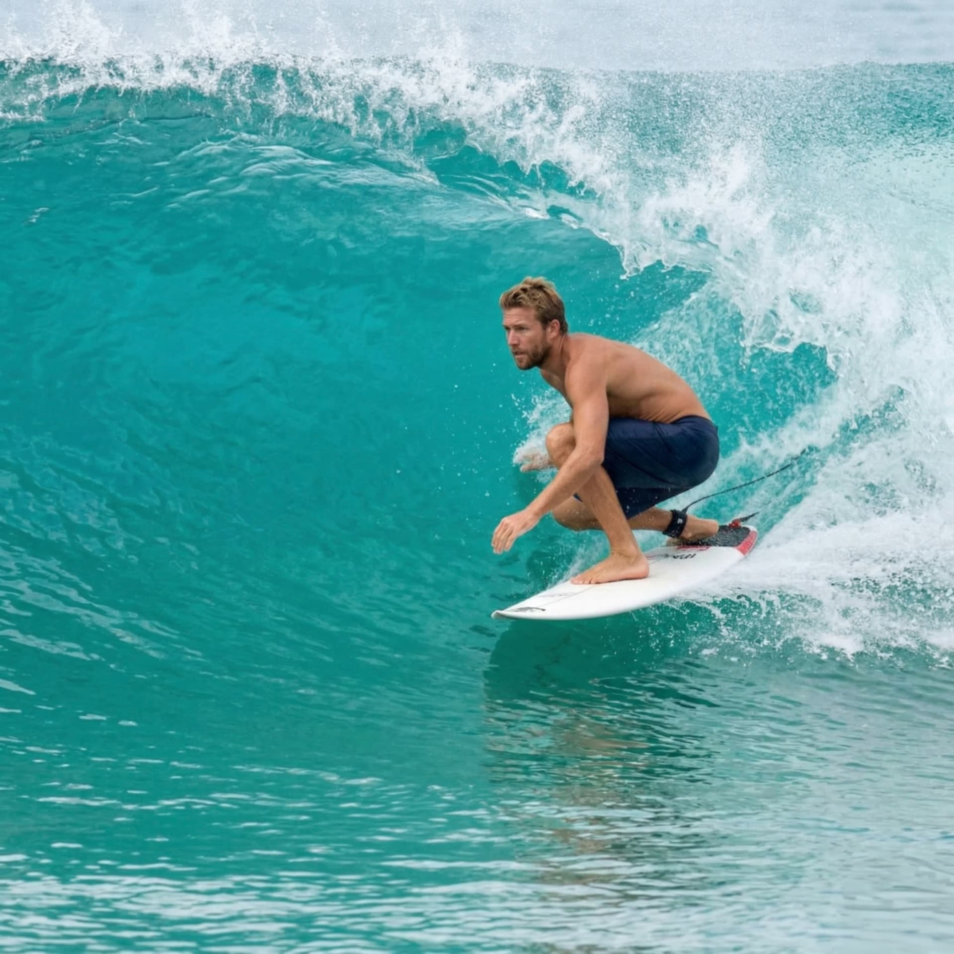 Surfer riding a barrel wave
